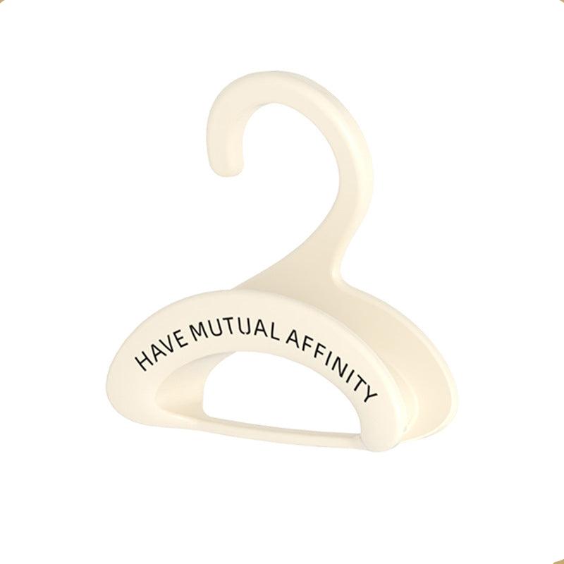 Cârlige inteligente pentru a suspenda gențile fără a le deteriora