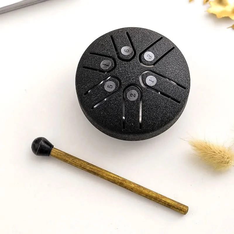 Mini tambor relaxante com sons calmantes integrados 