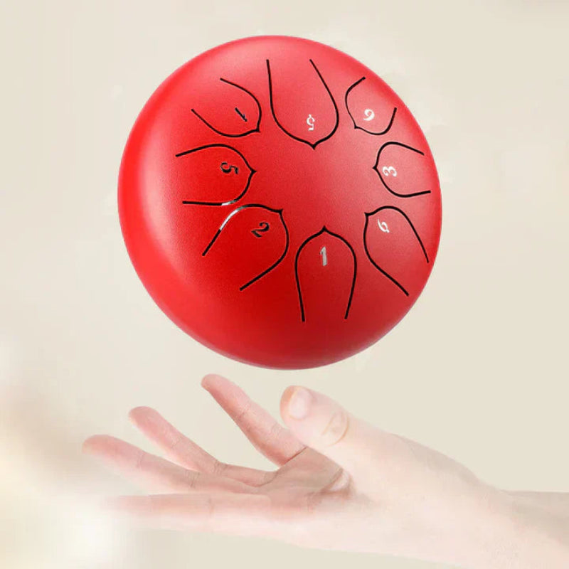 Mini avslappnande trumma med integrerade lugnande ljud 